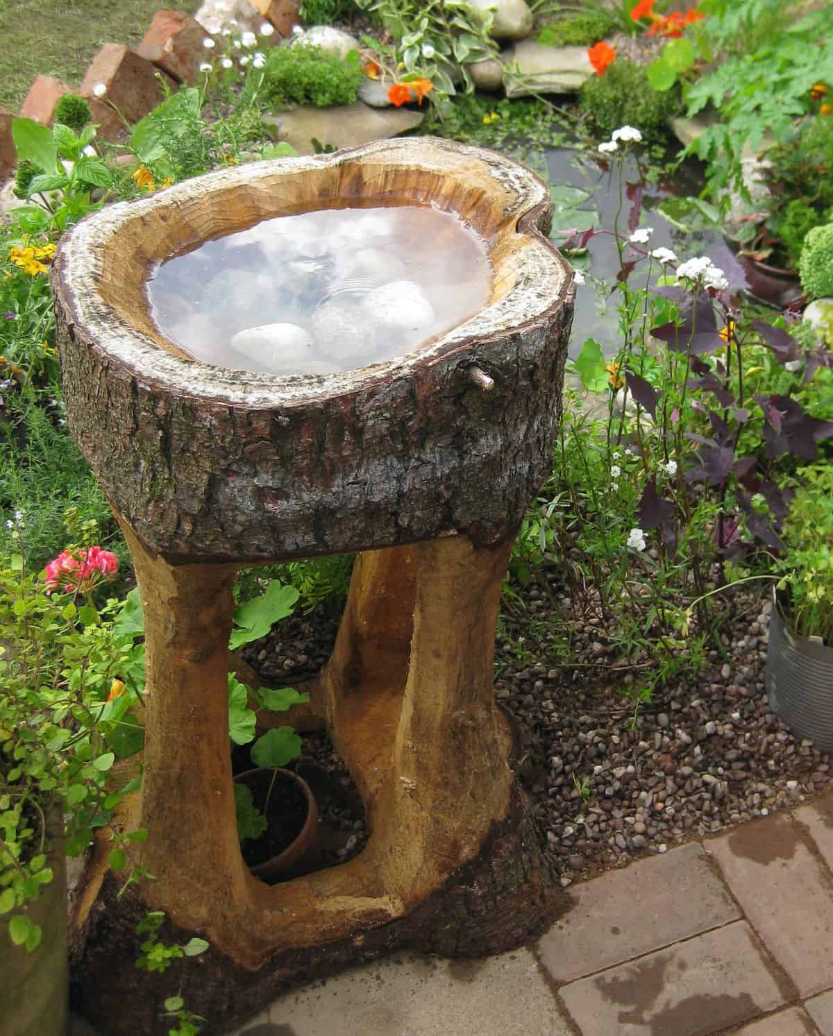 Carved-Tree-Trunk Bird Bath