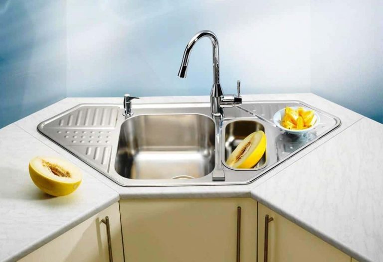 kitchen sink with faucet on corner