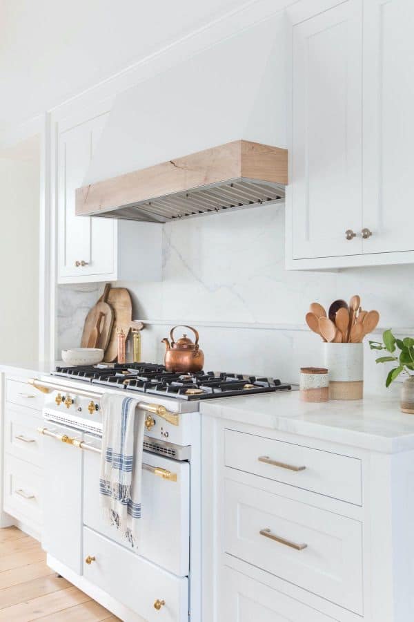 White Kitchen with a Metallic Touch (by. housebeautiful.com)