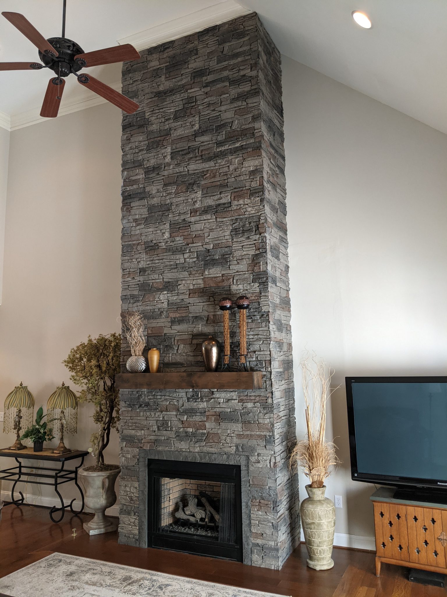 Stone Floor to Ceiling Fireplace