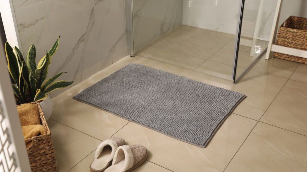 Towels and bath mats are crucial in keeping your windowless bathroom smelling fresh